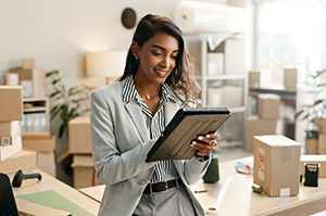 woman working on her tablet