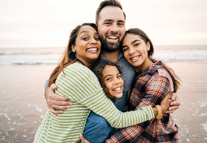 Family having fun at the beach.